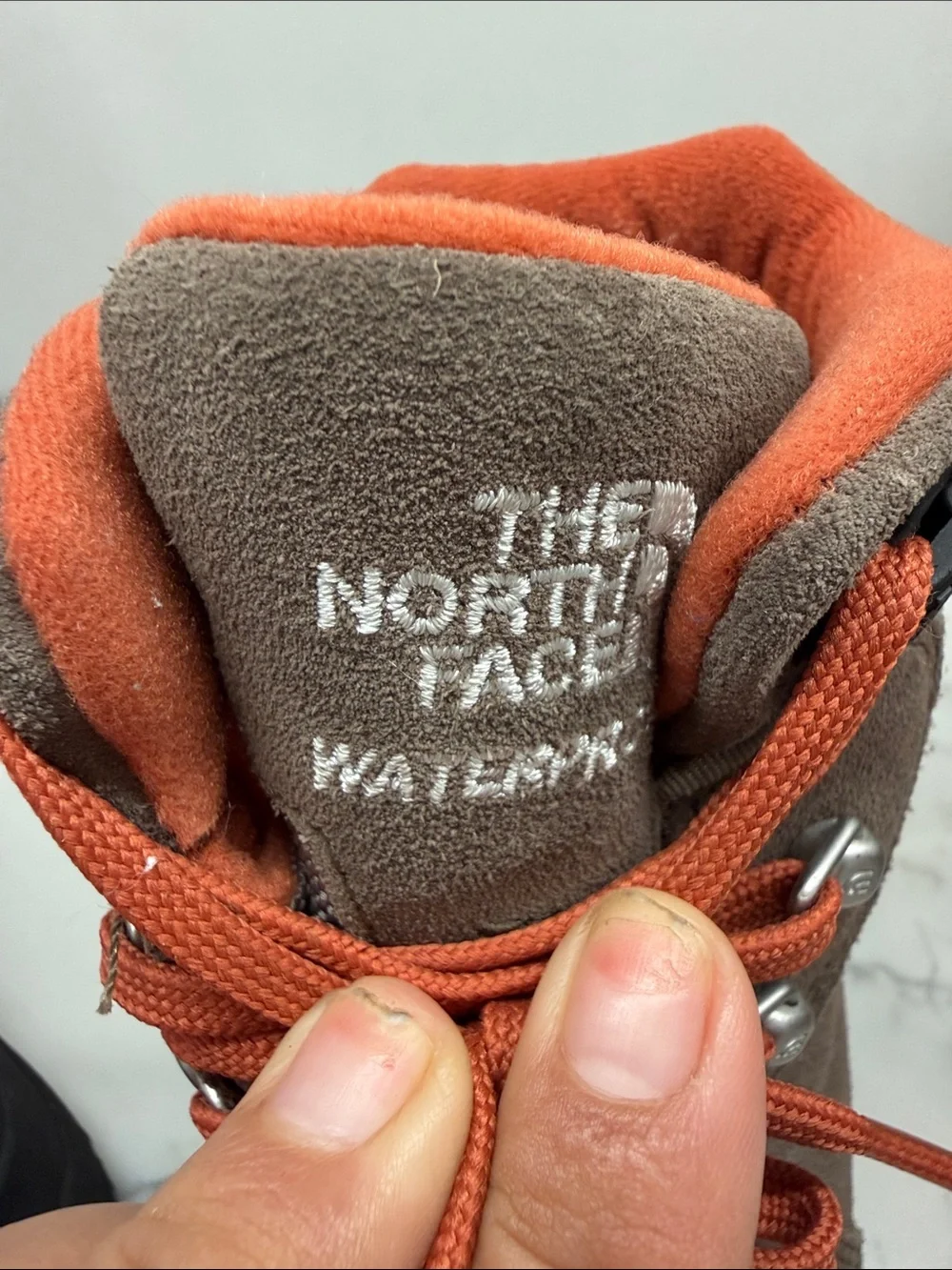 The North Face Brown Suede Kids Boots with Orange Laces